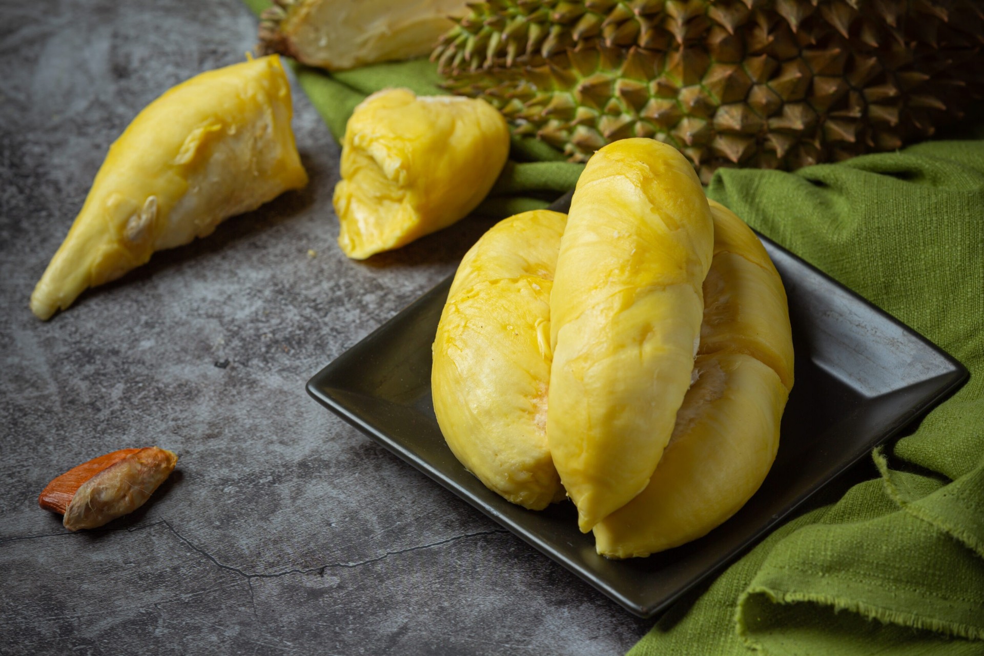 golden yellow durian flesh seasonal fruit thai fruit concept scaled